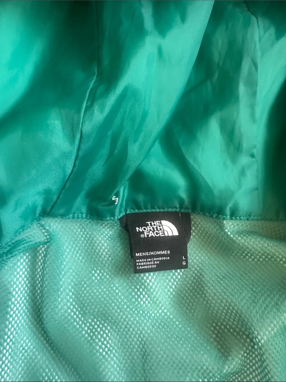 The North Face Teal and Black Hooded Rain Jacket